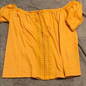 yellow off the shoulder shirt